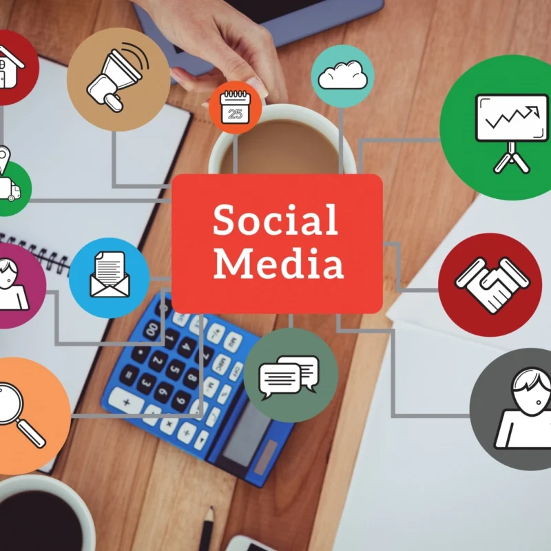 Small business owner working with a social media marketing agency to grow brand awareness and customer engagement through social media platforms